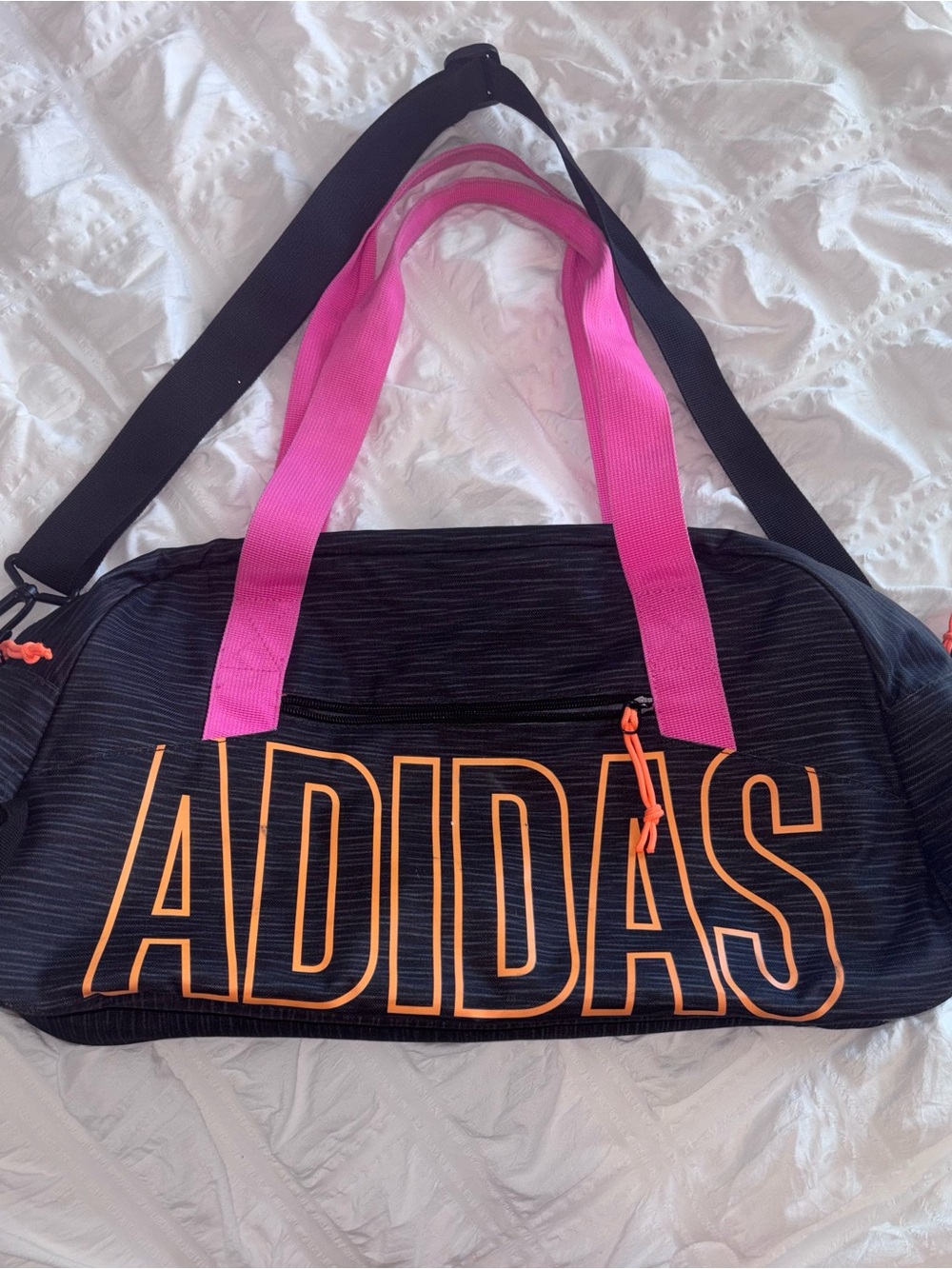 adidas Black Duffel Bag with Pink Handles and Orange Logo